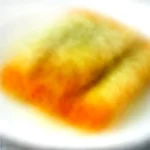 Oven-Baked Buffalo Chicken Taquitos with Avocado Crema